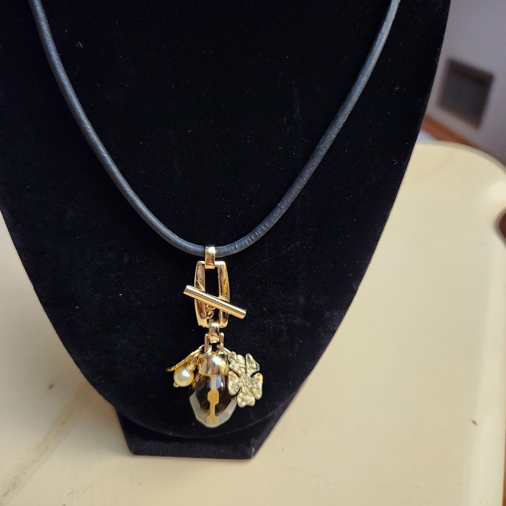 Amber and Gold Tone Pendant Necklace